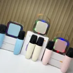 Mini karaoke infantil con 2 micrófonos y luces