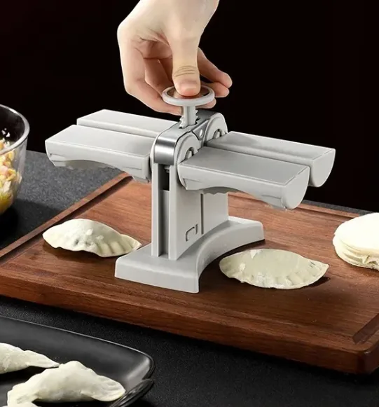 Molde doble para hacer empanadas