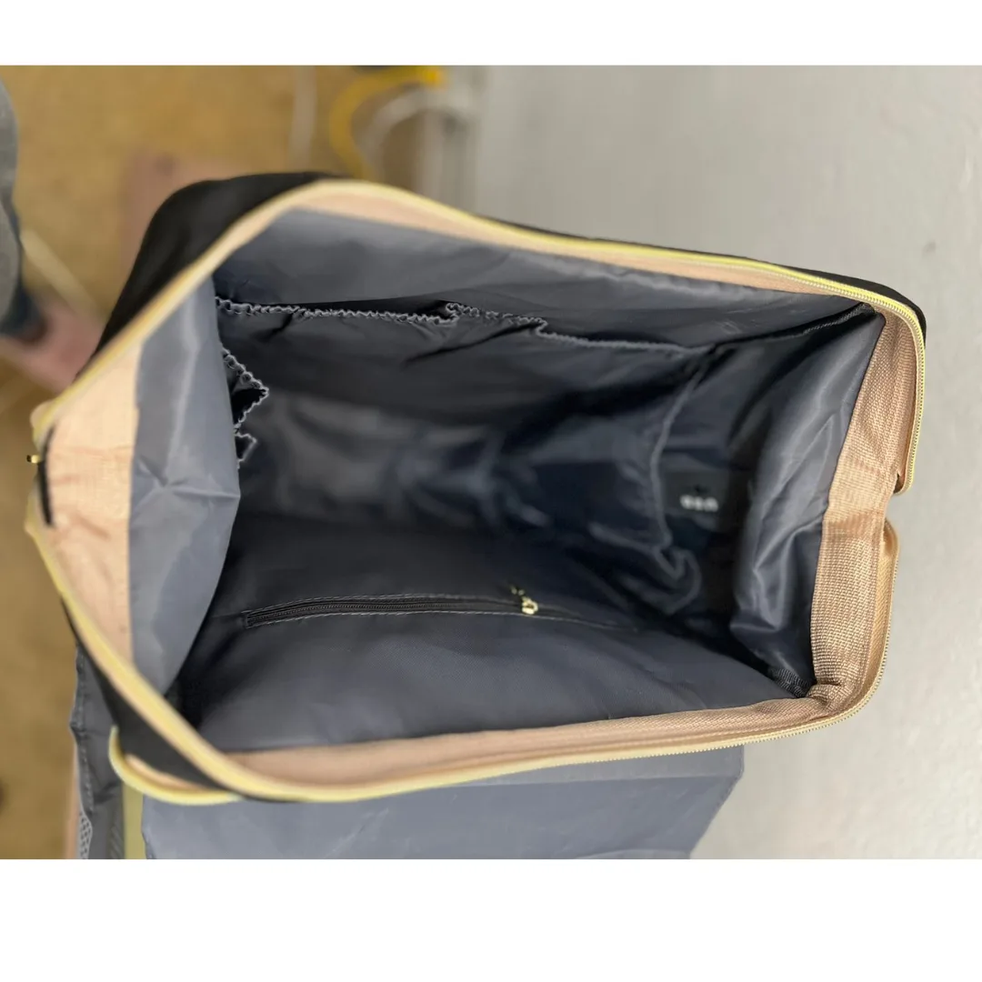 Morral pañalera con cuna plegable y cambiador