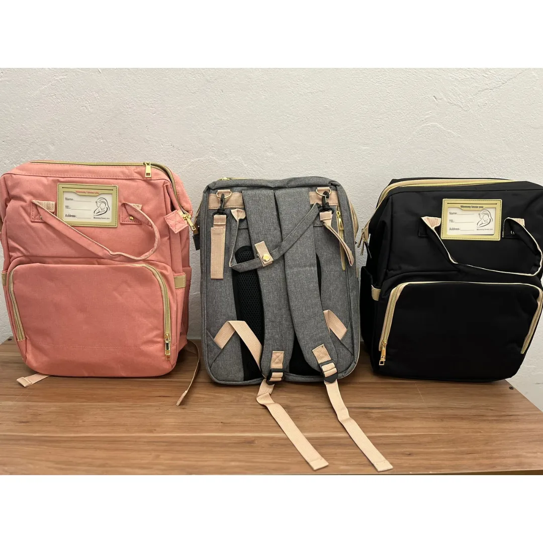 Morral pañalera con cuna plegable y cambiador